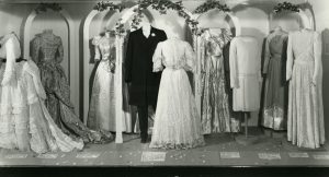 Black and white image of wedding gowns from the turn of the 19th century