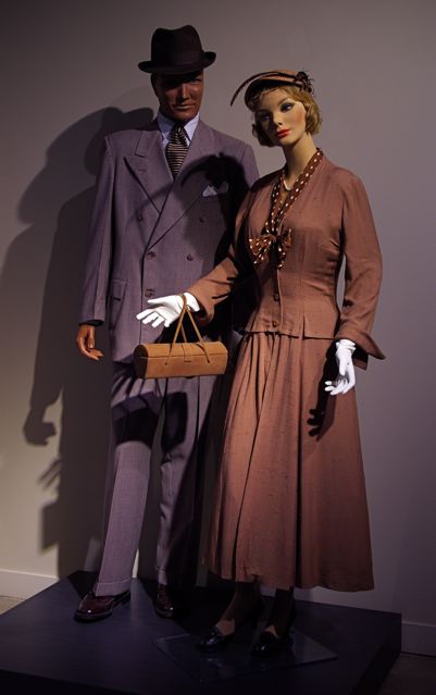 Exhibition with two mannequins; one female and one male.