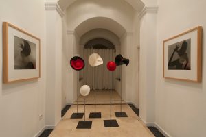 hats mounted in a corridor