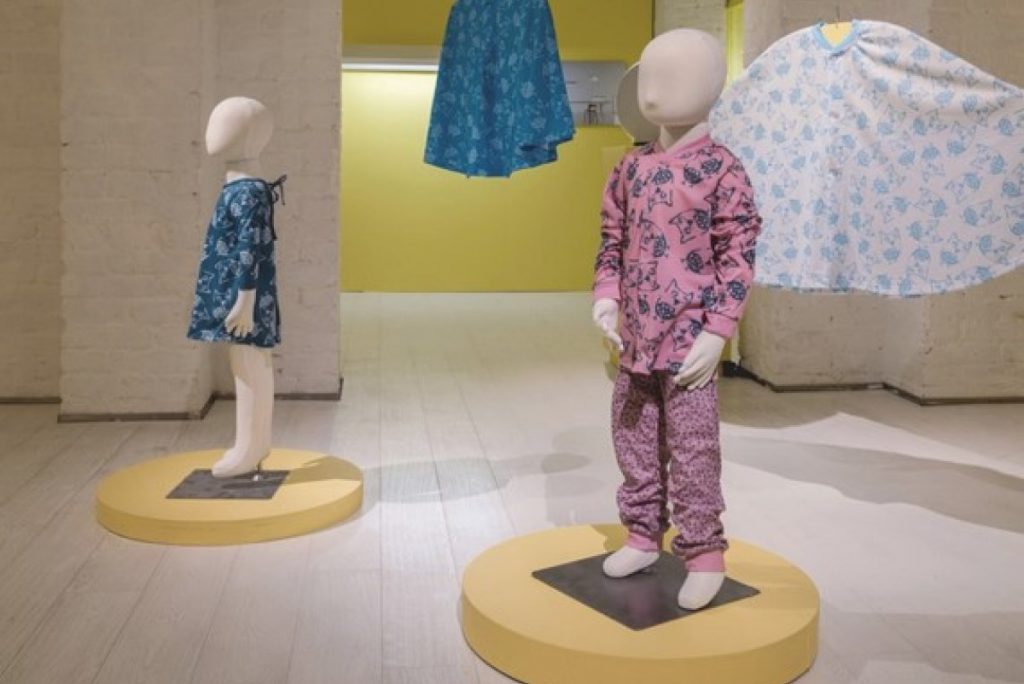 Exhibition display of dressed children's mannequins