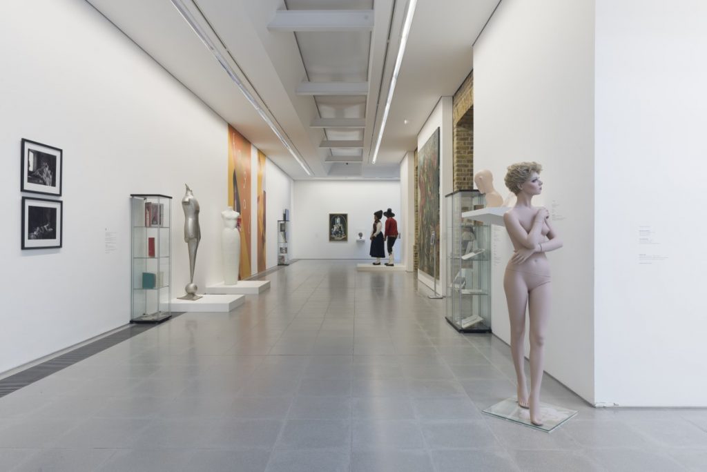 Exhibition display of corridor and unclothed mannequins