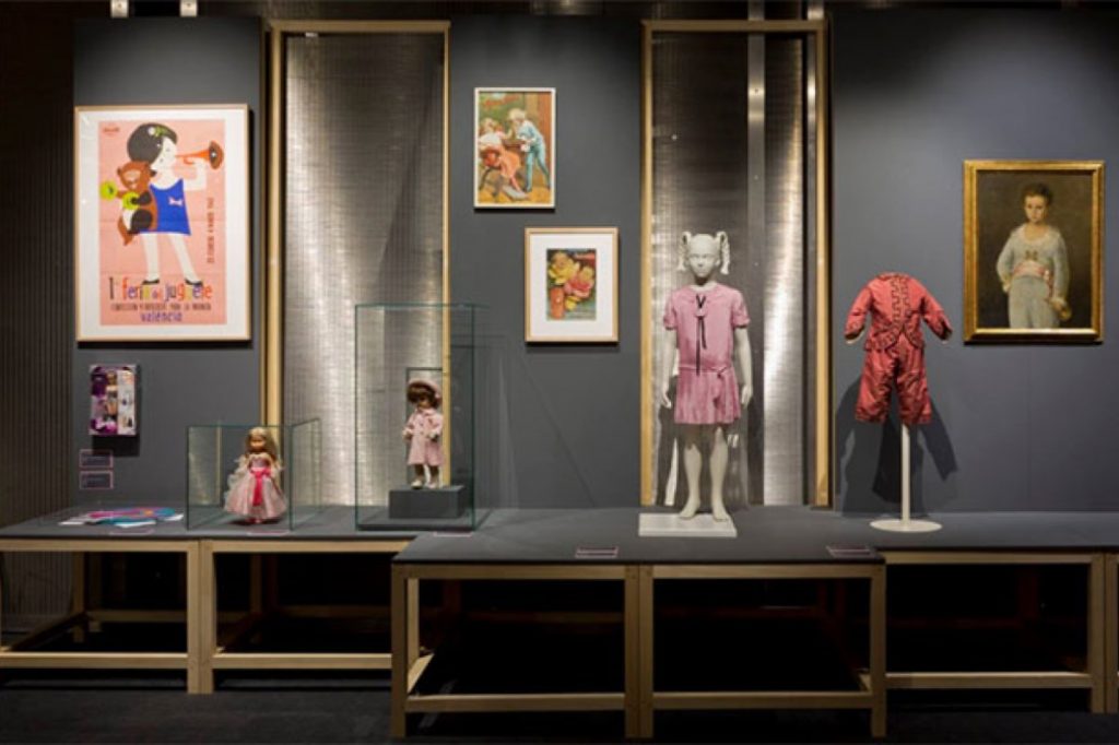 Exhibition display of children's dressed mannequins
