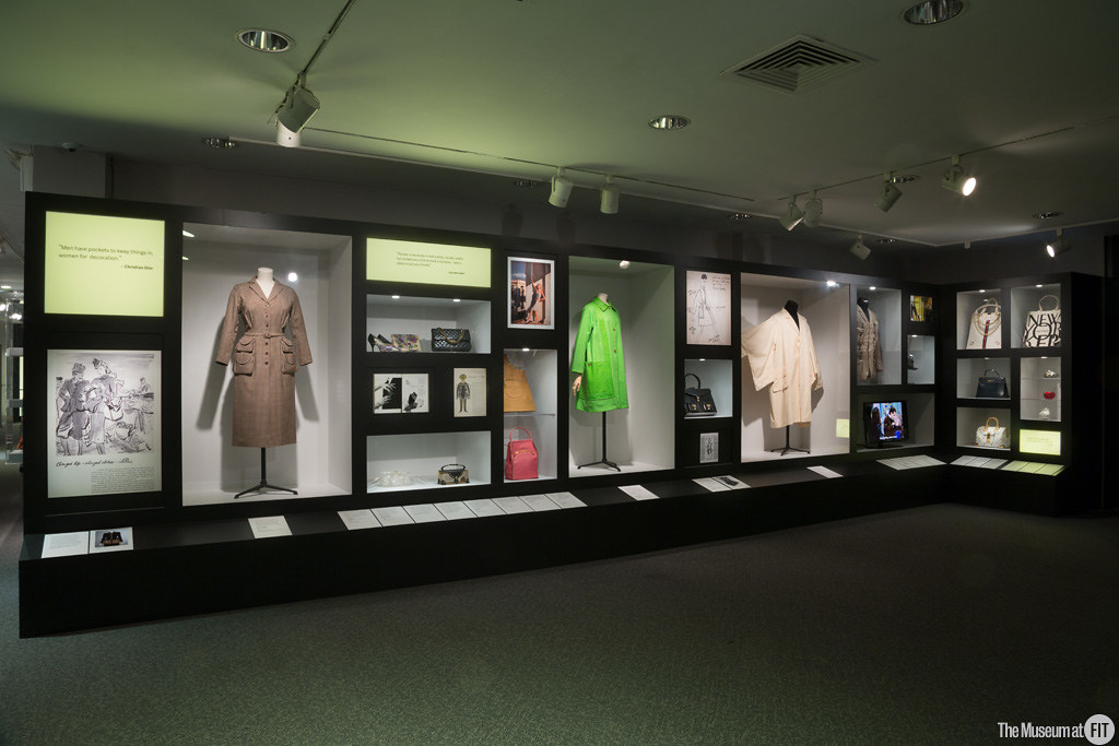Exhibition display of dress and handbags