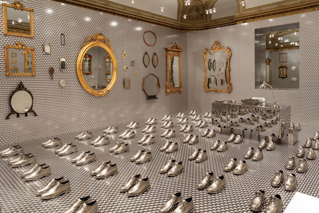 Exhibition display of silver shoes