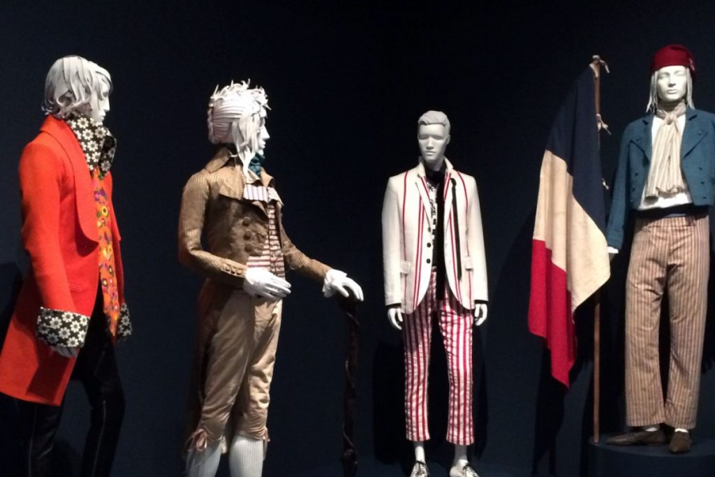 Exhibition display of dressed mannequins in menswear