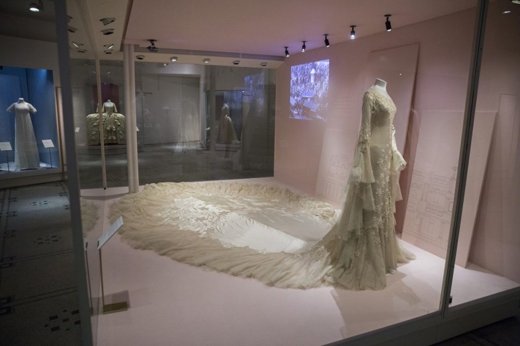 Exhibition display of dressed mannequin in wedding attire