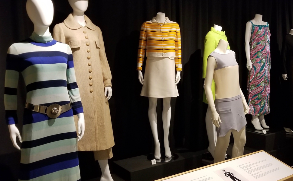 Exhibition with mannequins displaying late 1960s fashions by Cardin, Ungaro, and Courreges.
