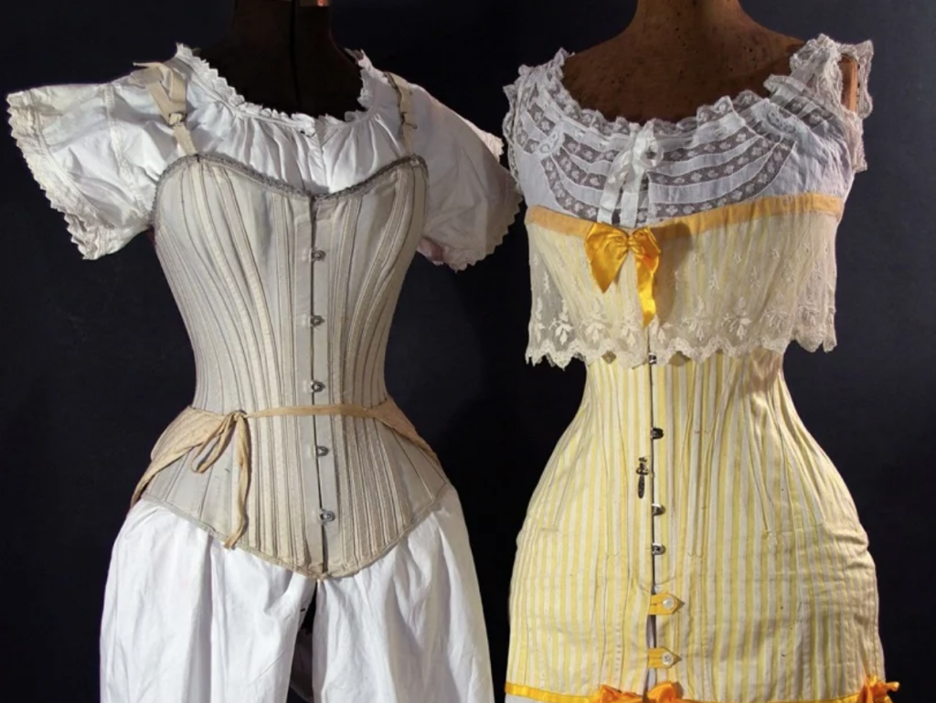 two corset ensembles on display