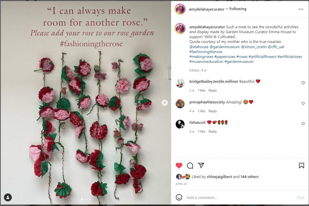 strings of roses hanging on the wall with inscription above