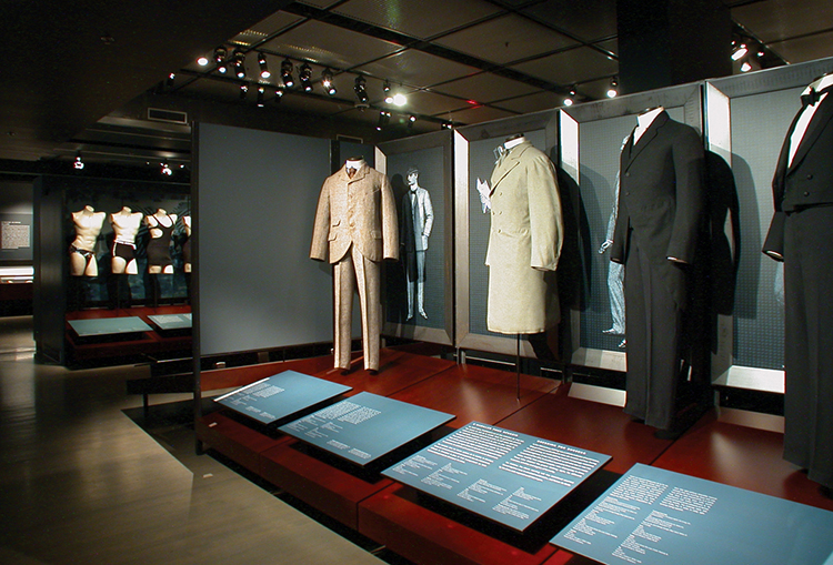exhibition display of mannequins dressed in menswear