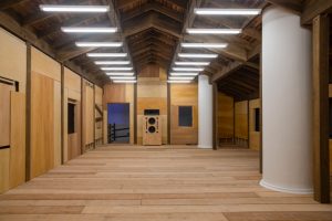 Exhibition gallery wooden floor and doors and pillars