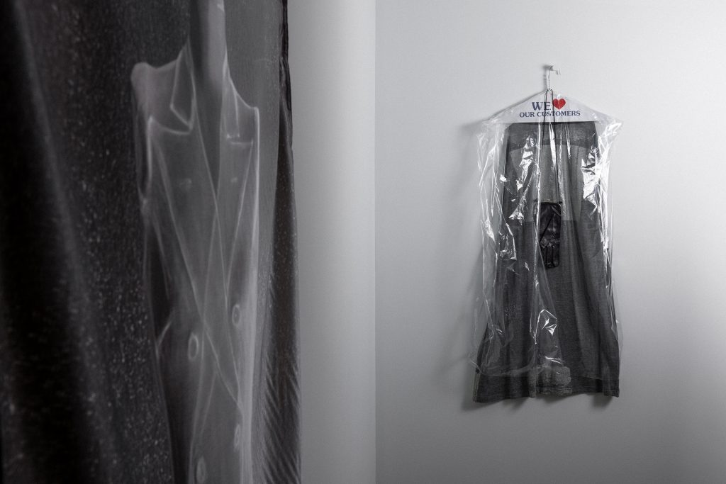exhibition display of garment in transparent plastic bag
