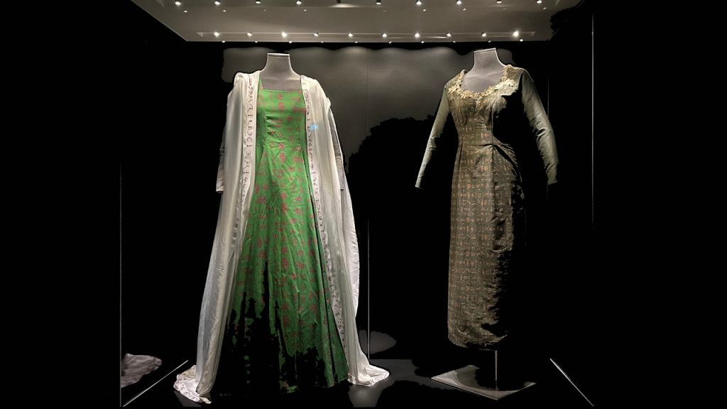 A Dress for Ramlah (left green) and A Dress for Akunma (right brown), on display in we make our own histories