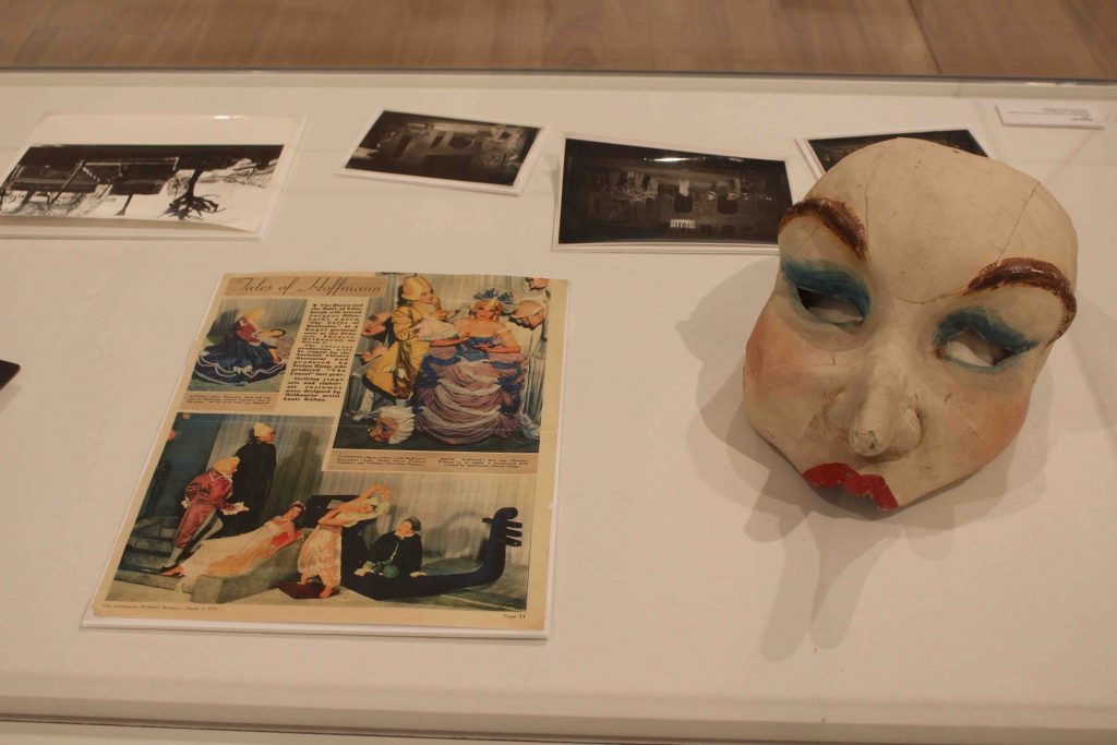 A theatre mask with red lips and blue eyeshadow. 5 photographs depicting acting scenes.