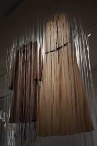 hanging garment on display covered by shapes of icicle appearance