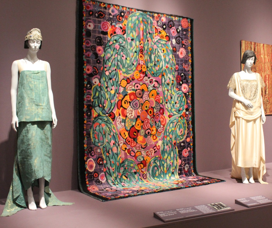Two female dresses in hues of green and yellow.