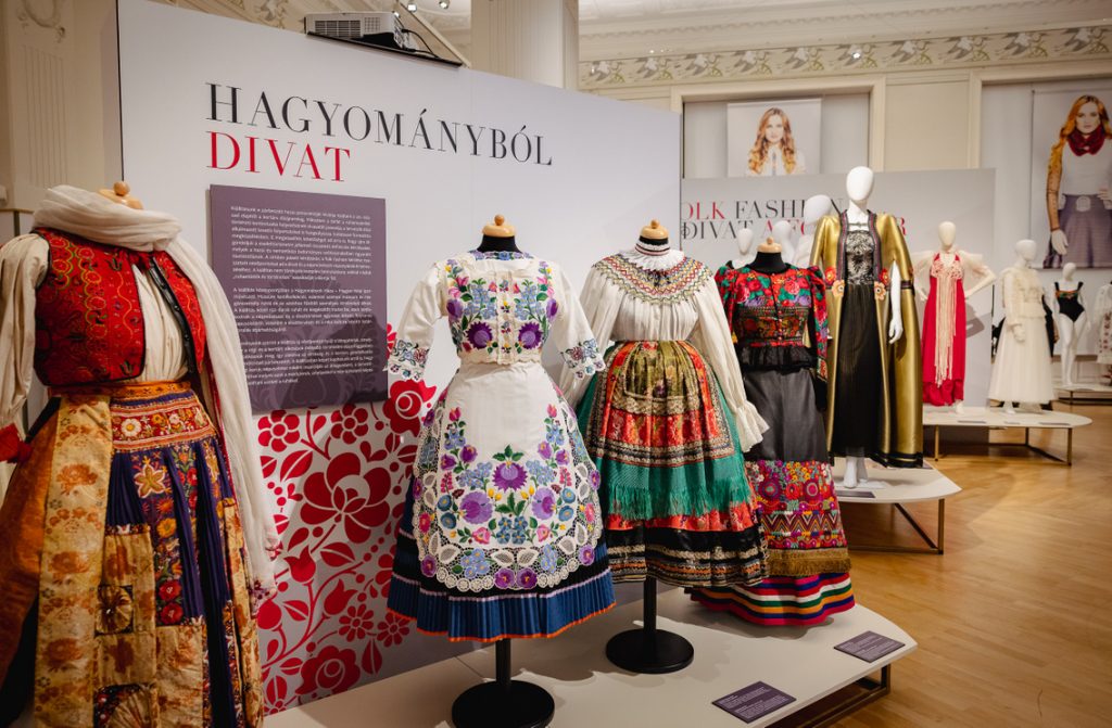 Traditional colourful dresses in hues of green, white, red and green.