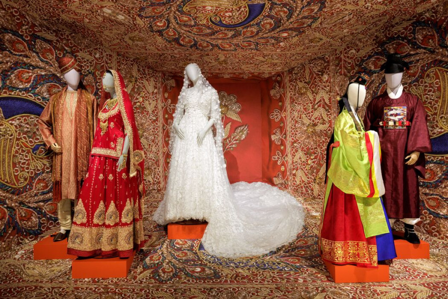 Wedding attire from different cultures in hues of red, white, green and brown.