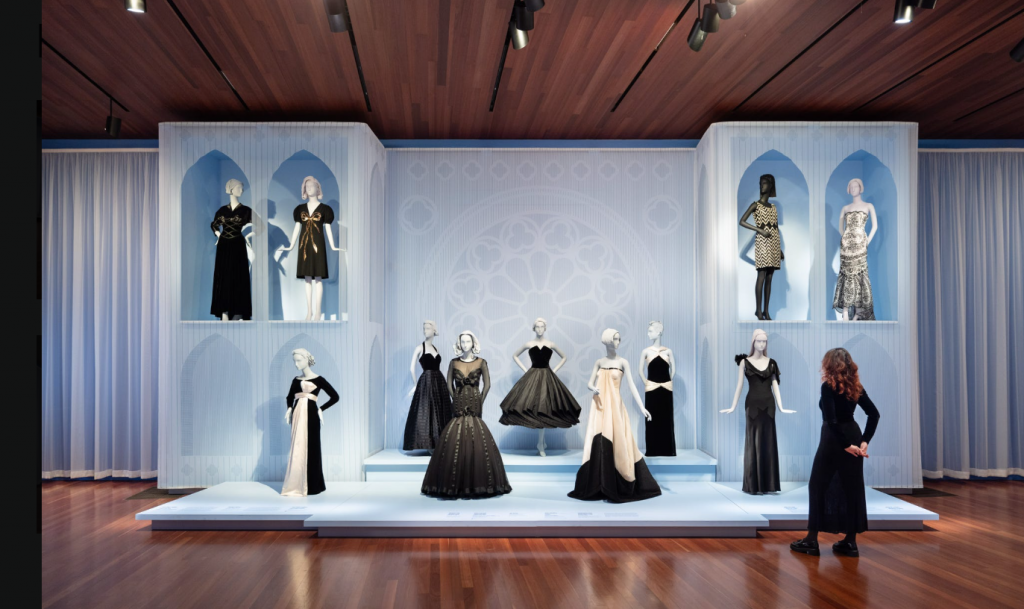 A collection of gowns in hues of black and white.
