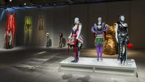 mannequins on display wearing soft tube shaped sculptural pieces